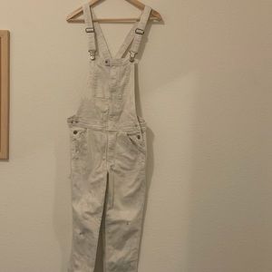 White overalls with floral underparts
